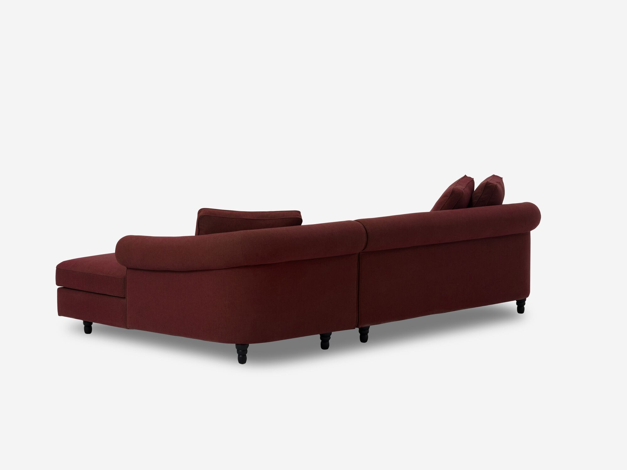 Back corner view of deep red modern sectional sofa